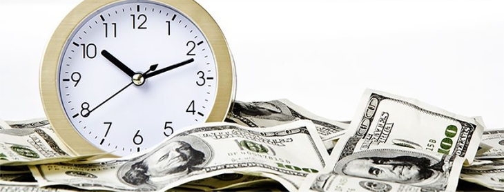 12947530 - close-up of time and money with white background